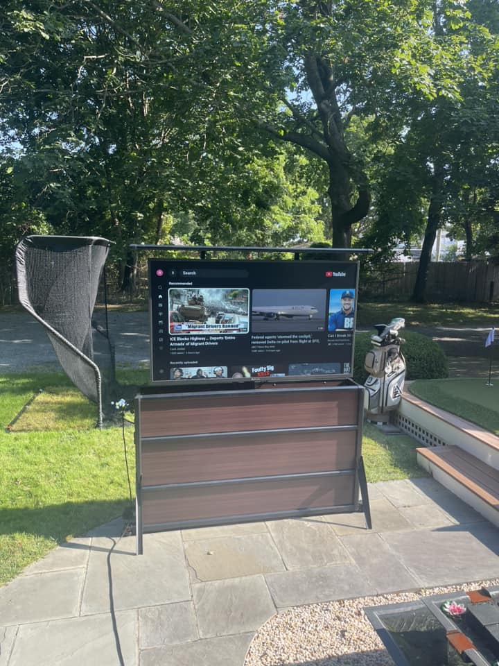 Enjoy outdoor entertainment with a sleek TV lift cabinet.