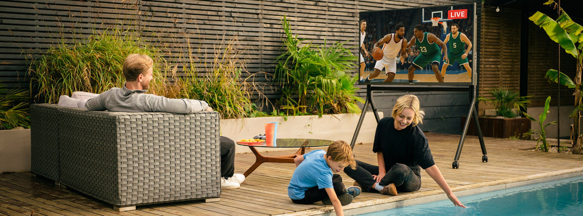 Outdoor entertainment setup featuring the Sylvox Cinema Series TV